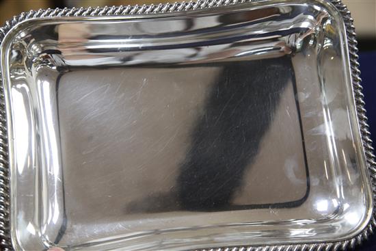 A George V silver entree dish and cover with handle by Mappin & Webb, 52 oz.